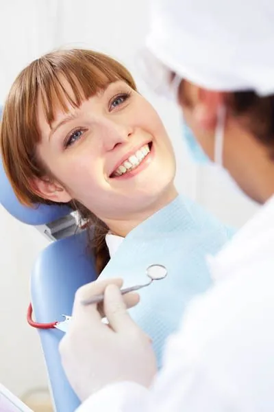 woman receiving dental care at Beacon Hill Dental