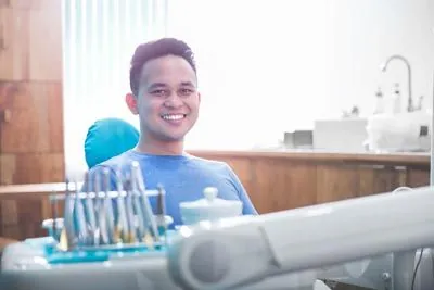 man smiling during his visit to Beacon Hill Dental