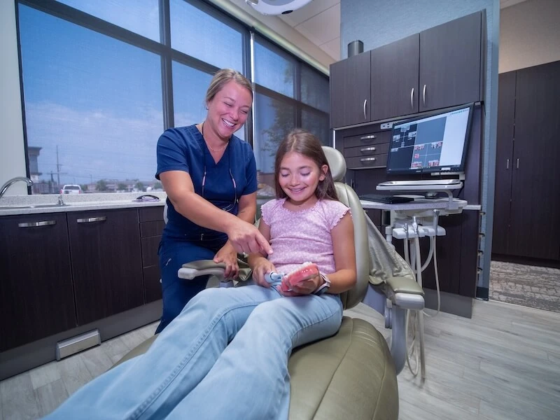 Young patient getting a dental exam at Beacon Hill Dental in Crown Point, IN