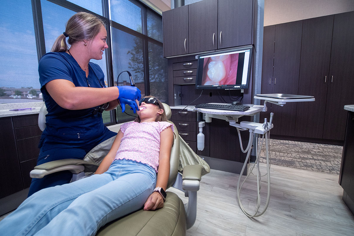 Young patient getting a dental exam at Beacon Hill Dental in Crown Point, IN