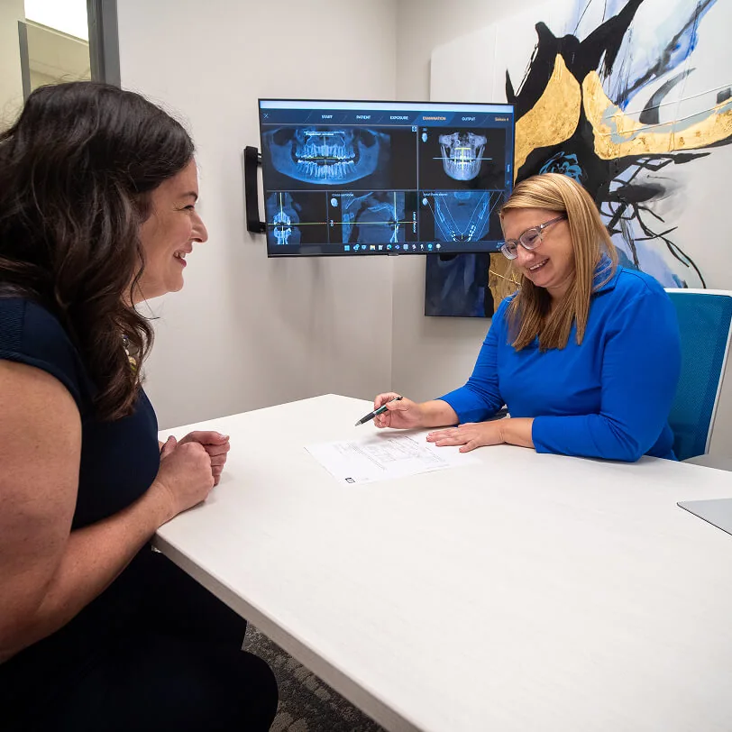 A patient discussing dental financing options at Beacon Hill Dental in Crown Point, IN.